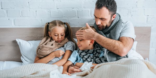 man with sick kids